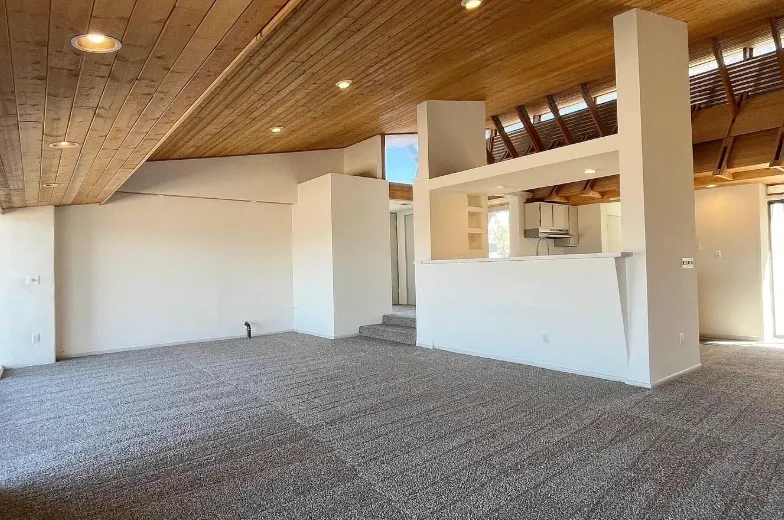 Empty co-working space before AI virtual staging
